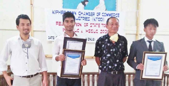 Members of Kiphire Town Chamber of Commerce & Industries with the state toppers of HSLC & HSSLC of Kiphire town on June 17. (Photo Courtesy: KTCCI)